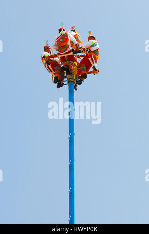 Papantla Flying Men Flying man in Playa del Carmen, Mexico Stock Photo