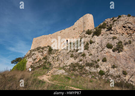 Tourist visiting Medieval castle in Poza de la Sal, Burgos, Spain. Stock Photo