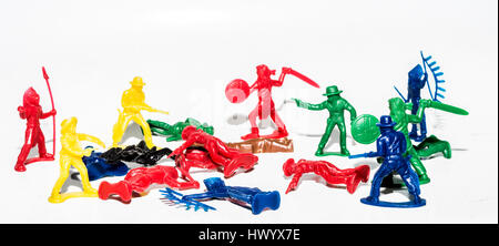 Plastic wild west toys fighting each other Stock Photo