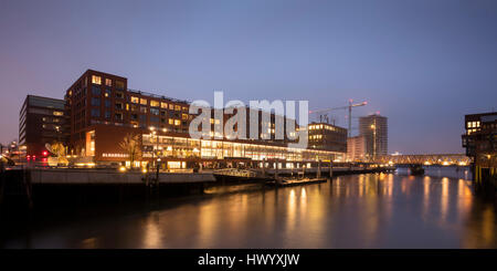 Germany, Hamburg, HafenCity, Elbarkaden at Magdeburger Hafen by twilight Stock Photo