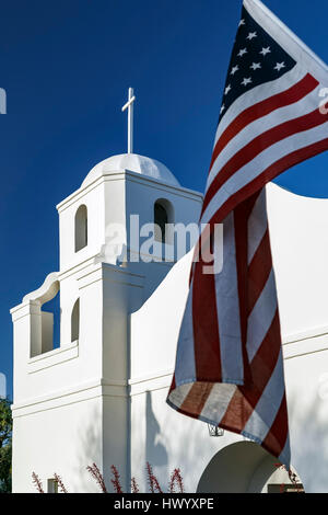 Bell Tower and American flag, Old Adobe Mission (Our Lady of Perpetual Help Catholic Church), Old Town Scottsdale, Arizona USA Stock Photo