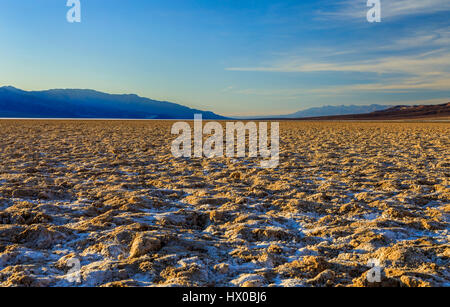 This is a view of the crystalized salt layer in the Badwater Basin area of Death Valley National Park, California, USA. Stock Photo