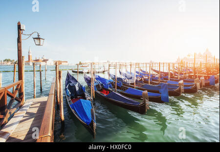 Gondolas on Grand canal in Venice, San Giorgio Maggiore church. San Marco. Beautiful summer landscape