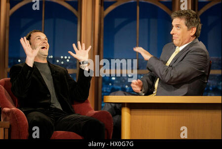 Actor Jonny Lee Miller, left, with host Craig Ferguson during a segment of 'The Late Late Show with Craig Ferguson' at CBS Television City on April 3, 2008 in Los Angeles, California. Photo by Francis Specker Stock Photo