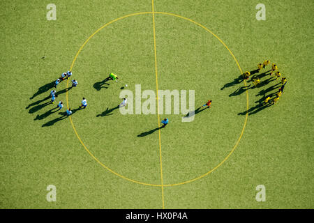 Football players at the center circle, soccer field, North Rhate-Westphalia, Germany Stock Photo