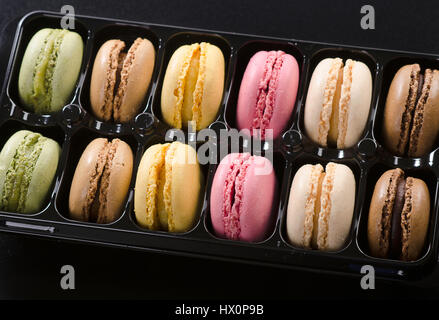 Colorful macaroons in box. Top view Stock Photo