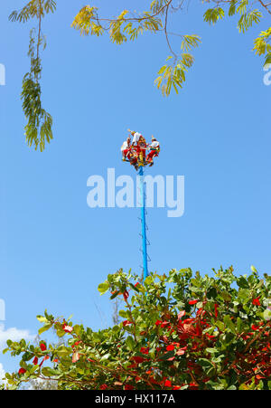 Papantla Flying Men Flying man in Tulum, Mexico Stock Photo
