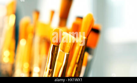Set of paint brushes close-up. Art studio concept. Stock Photo