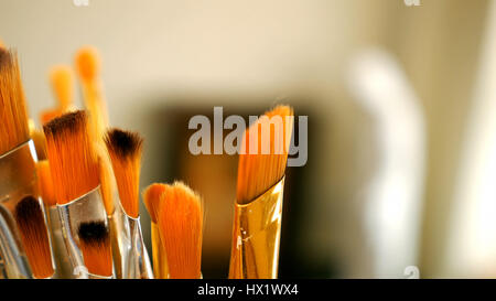 Set of paint brushes close-up. Art studio concept. Stock Photo