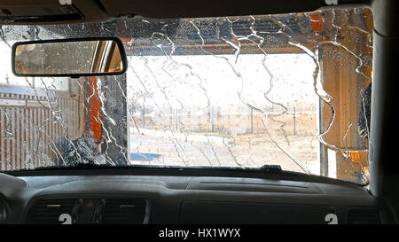 Automatic tunnel car wash. View from inside. Stock Photo