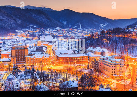 Brasov, Romania. Old town during the winter at sunset. Stock Photo