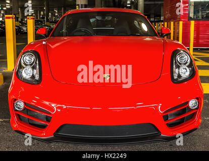 Sydney, Australia - January 21, 2015: Front view of a red turbo sport car Ferrari F40 in the airport parking lot. Concept of luxory and speed. Stock Photo