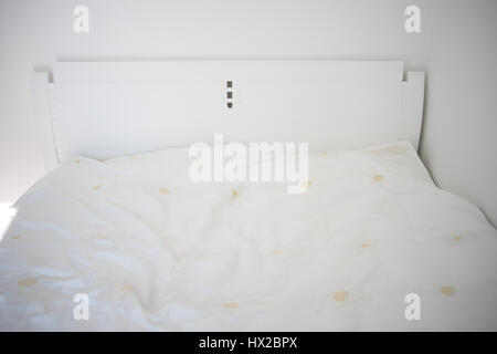 Close up white bedding sheets Stock Photo