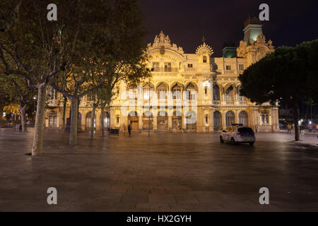 Headquarters building of the Port Authority of Barcelona at night in Catalonia, Spain Stock Photo