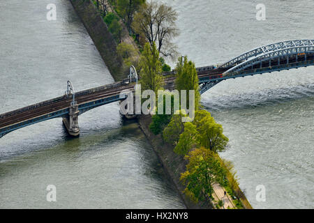 Railway track and bridge crossing over a walkway in the River Seine in paris. Stock Photo