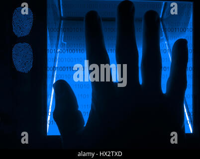 blue cybersecurity digital fingerprint scanning on a green screen Stock Photo