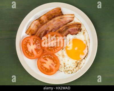 Authentic Flat Lay Colourful English Breakfast, Fried Bacon Egg, Sunny Side Up, and Grilled Tomatoes