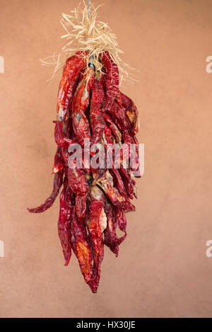 Ristra of drying chile peppers in Old Town Albuquerque, New Mexico. Stock Photo