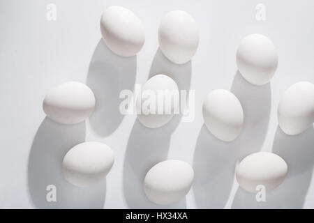 Close up of white eggs on white background. Stock Photo