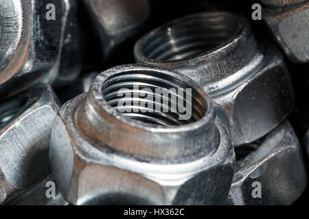 Background. Screw nuts closeup. Stock Photo