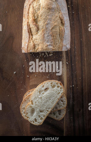 Partially-sliced of white bread - from above Stock Photo