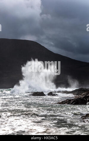 Waves break on Maghera beach rocks near Ardara, County Donegal, Ireland part of Ireland's Wild Atlantic Way Stock Photo