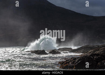 Waves break on Maghera beach rocks near Ardara, County Donegal, Ireland part of Ireland's Wild Atlantic Way Stock Photo