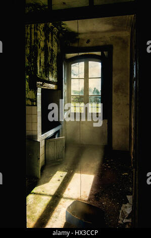 Kitchen in abandoned house Stock Photo