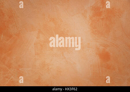 Orange wall with brush strokes as background Stock Photo