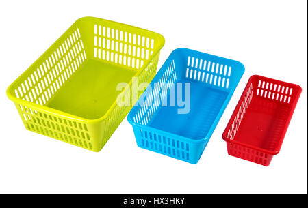 Colored plastic containers for storing household accessories, isolated on white, saved path selection. Stock Photo
