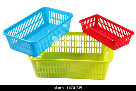 Collection of three plastic boxes of different colors and sizes, the household storage, isolated on white. Stock Photo