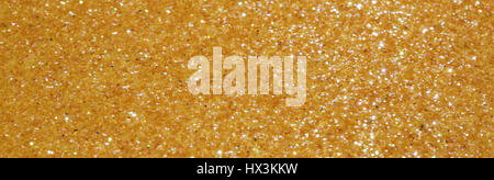 horizontal background golden glitter very bright Stock Photo