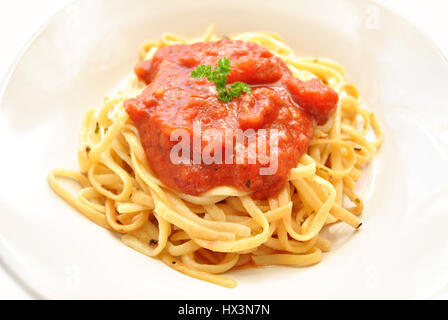 Pasta fettuccine with spicy tomato sauce, bell peppers and basil. Healthy  Mediterranean diet Stock Photo - Alamy