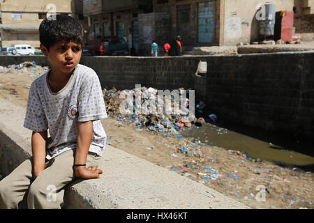 Taiz, Yemen. 23rd March 2017.  An environmental disaster threatens millions of inhabitants in Yemen as a result of the ongoing conflict. As the municipal headquarters have been shut down and the waste collection service has stopped in Taiz, the uncollected waste has leaked into the sewage system through torrential rain. Recently Taiz hospitals have received many cases of cholera and dengue fever as a result of the worsening of the humanitarian situation in the city. Credit: ZUMA Press, Inc./Alamy Live News Stock Photo