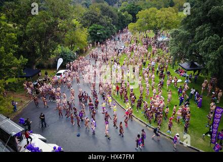 Johannesburg, South Africa. 24th Mar, 2017. Runners prepare before participating in the Daredevil Run in Johannesburg, South Africa, on March 24, 2017. About 2500 men took part in the 2017 Daredevil Run here on Friday while the charity event also kicked off in other three South African cities: Cape Town, Durban and Nelspruit at the same day. The organizers try to raise public awareness of preventing cancer through the 5km initiatives, and they believe that prevention is easier than cure. Credit: Zhai Jianlan/Xinhua/Alamy Live News Stock Photo