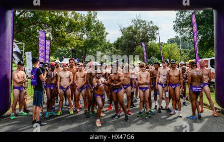 Johannesburg, South Africa. 24th Mar, 2017. Runners participating in the Daredevil Run pose for a photo at the start line in Johannesburg, South Africa, on March 24, 2017. About 2500 men took part in the 2017 Daredevil Run here on Friday while the charity event also kicked off in other three South African cities: Cape Town, Durban and Nelspruit at the same day. The organizers try to raise public awareness of preventing cancer through the 5km initiatives, and they believe that prevention is easier than cure. Credit: Zhai Jianlan/Xinhua/Alamy Live News Stock Photo