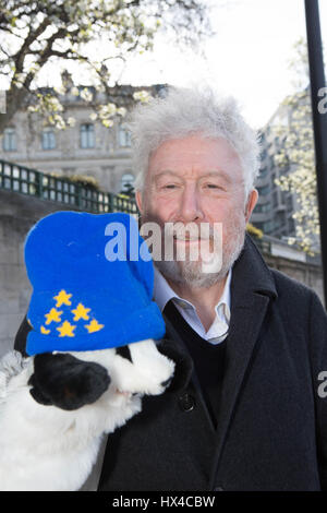 London, UK. 25th Mar, 2017. Unite for Europe national march Bob Clark holding Prollus the bager Credit: Brian Southam/Alamy Live News Stock Photo