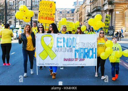 Glasgow, Scotland, UK. 25th March, 2017. Taking part in the 4th worldwide march to raise awareness of the medical condition that affects approximately 1.5 million women in the UK alone, a number of men and women had a rally in George Square and a march through the city centre, supported by the famous model and TV presenter CAROL SMILLIE Credit: Findlay/Alamy Live News Stock Photo