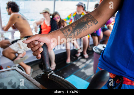 Detail of the boat captain tattoo showing the map of Ilha Grande. Angra Dos Reis, RJ, Brazil. Stock Photo