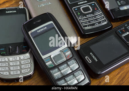 Bangkok, Thailand - March 24, 2017 : Nokia mobile phones on wooden background. Stock Photo