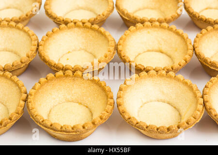 Tartlets empty on white background. Studio Photo Stock Photo