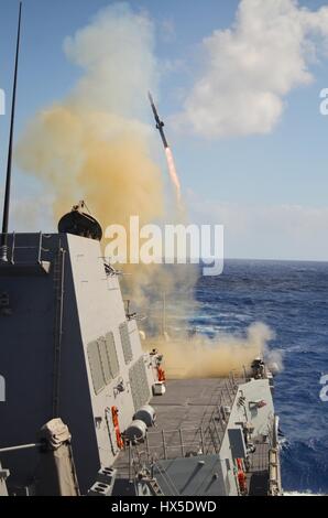 Guided-missile destroyer USS Michael Murphy (DDG 112) fires its first missile while on the Pacific Ocean, 2013. Image courtesy Joshua A. Flanagan/US Navy. Stock Photo