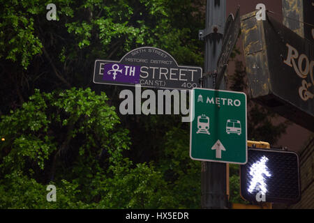 Prince logo stuck on 6th Street sign in downtown Austin, Texas. Stock Photo