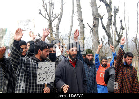 Carrying placards and banners reading ‘Reopen the Pathribal fake ...