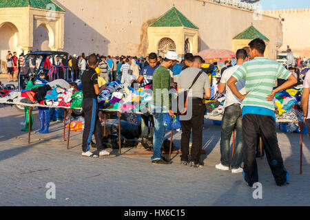 Meknes, Morocco.  Vendor of Used Clothing in the Place Hedime. Stock Photo