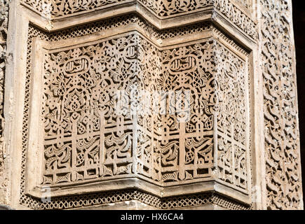 Meknes, Morocco.  Medersa Bou Inania, 14th. Century.  Floral Design and Calligraphy in Stucco. Stock Photo