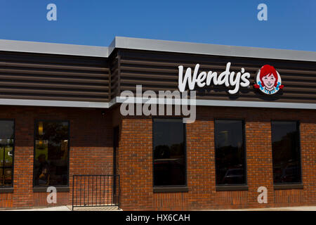 Indianapolis - Circa June 2016: Wendy's Retail Location. Wendy's is an International Fast Food Restaurant Chain VI Stock Photo