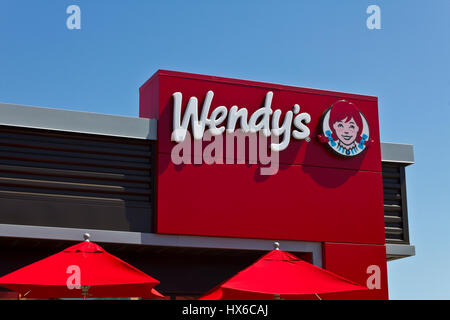 Indianapolis - Circa June 2016: Wendy's Retail Location. Wendy's is an International Fast Food Restaurant Chain III Stock Photo