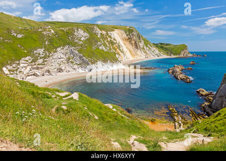 Looking down into the clear waters of Man O'War Bay from the long distance South West Coast Path on the Jurassic Coast, Dorset, England
