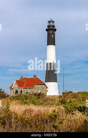 Fire Island lighthouse and the keepers quarters, Fire Island National Seashore, Suffolk County. Long Island, New York State Stock Photo